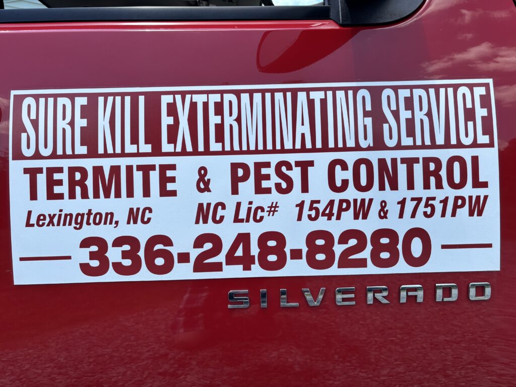 sure kill logo on the side of a work truck