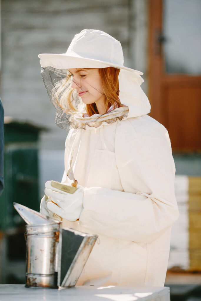Beekeeper working on bee prevention